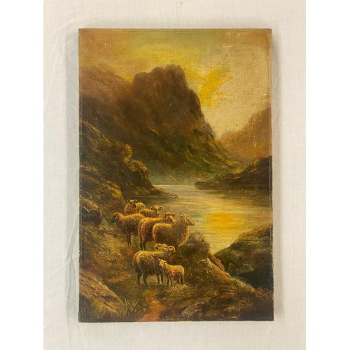 751 - EARLY 20TH CENTURY OIL ON CANVAS OF SHEEP IN A HIGHLAND LANDSCAPE