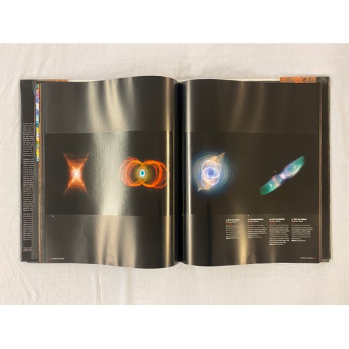 671 - HARD BACK OVERSIZED COSMOS BOOK AND BOOK OF THE COMPLETE EARTH BY DOUGLAS PALMER