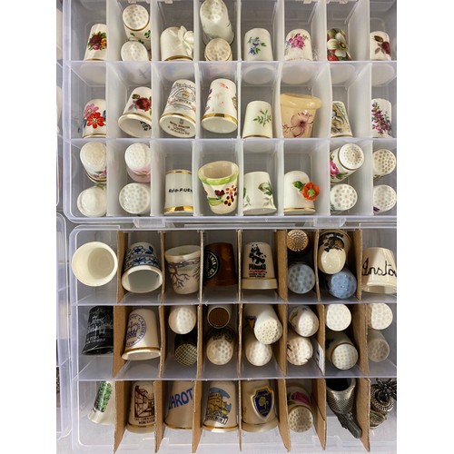 686 - LARGE QUANTITY OF PORCELAIN, ENAMELLED AND METAL THIMBLES WITH RACKS AND STANDS