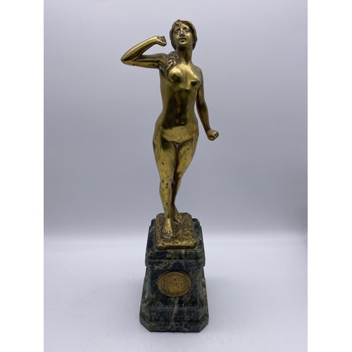 691 - BRASS FIGURE OF FEMALE NUDE 'THE AWAKENING' ON A GREEN MARBLE SOCLE WITH BRASS PLAQUE AWARD 38CM HEI... 