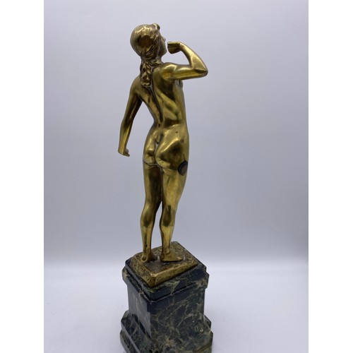 691 - BRASS FIGURE OF FEMALE NUDE 'THE AWAKENING' ON A GREEN MARBLE SOCLE WITH BRASS PLAQUE AWARD 38CM HEI... 