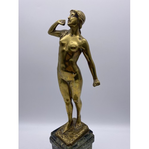 691 - BRASS FIGURE OF FEMALE NUDE 'THE AWAKENING' ON A GREEN MARBLE SOCLE WITH BRASS PLAQUE AWARD 38CM HEI... 