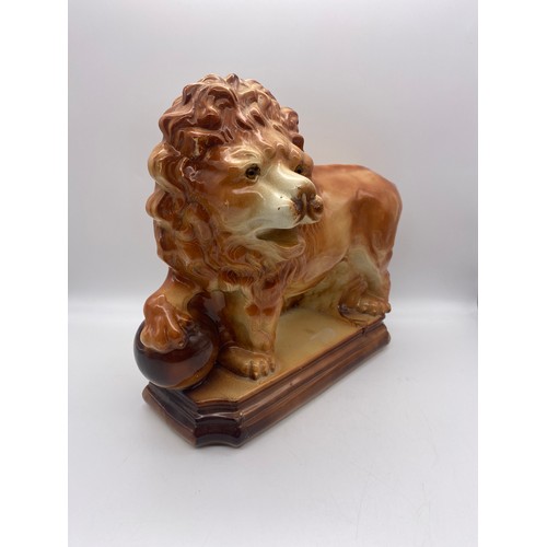 353 - POTTERY LION AND BALL FIGURE GROUP