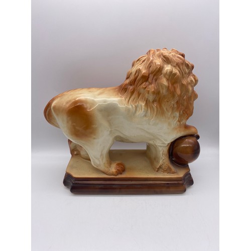 353 - POTTERY LION AND BALL FIGURE GROUP