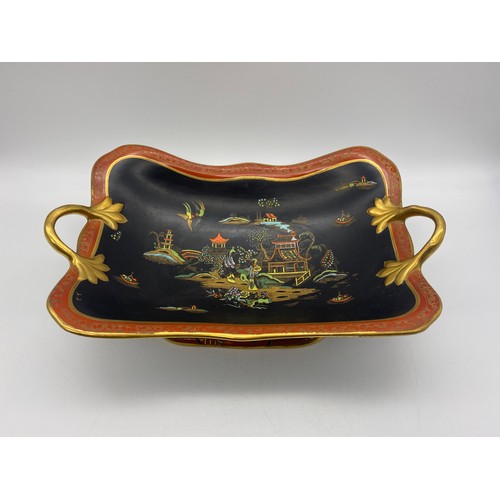 363 - CARLTONWARE GILDED TWIN HANDLED COMPORT AND CARLTONWARE BLACK GROUND FANCIFUL BIRD BOWL