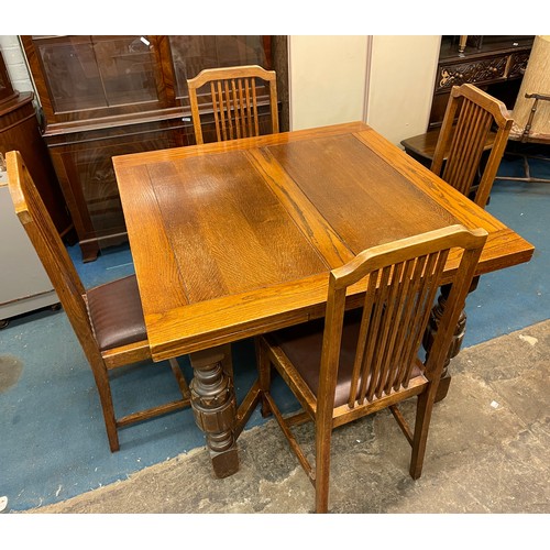 33 - 1930S OAK DRAWER LEAF DINING TABLE ON CARVED CROSS STRETCHER LEGS WITH MATCHING INVERTED BREAK FRONT... 