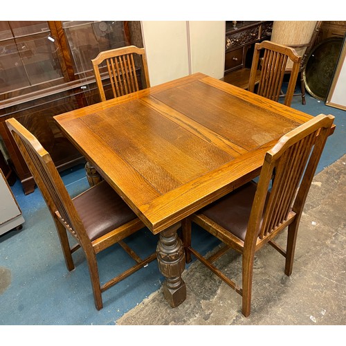 33 - 1930S OAK DRAWER LEAF DINING TABLE ON CARVED CROSS STRETCHER LEGS WITH MATCHING INVERTED BREAK FRONT... 