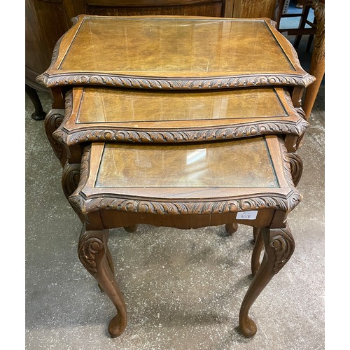 49 - NEST OF WALNUT CARVED CABRIOLE LEG TABLES