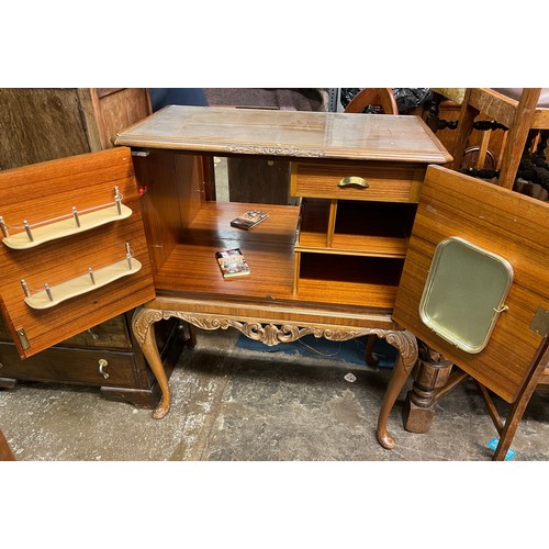 50 - WALNUT CROSS BANDED QUEEN ANNE STYLE DRINKS CABINET ON STAND