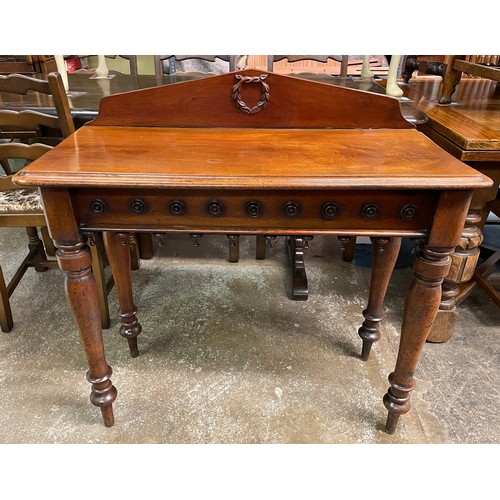 112 - VICTORIAN MAHOGANY SIDE TABLE WITH ARCHED GALLERY BACK AND TURNED FINIAL FRIEZE