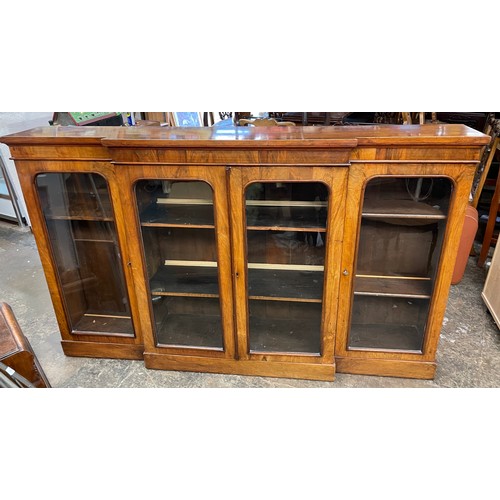 116 - VICTORIAN WALNUT BREAK FRONT GLAZED PIER CABINET