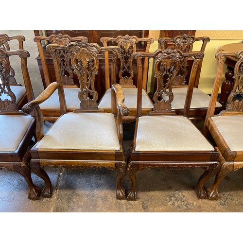 129 - SET OF EIGHT 18TH CENTURY STYLE CARVED DINING CHAIRS WITH RIBBAND BACKS ON CARVED CABRIOLE LEGS SEVE... 