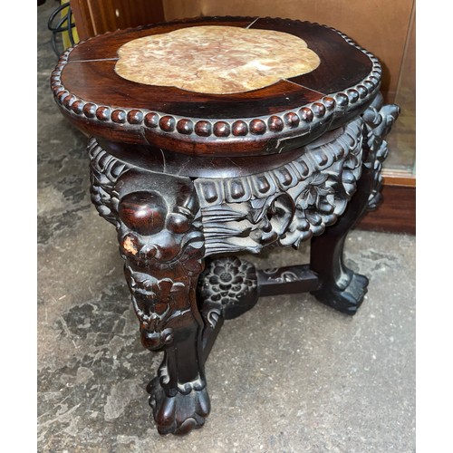 150 - EASTERN HARDWOOD CARVED JARDINIERE STAND WITH LOBED TOP INSET WITH MARBLE PANEL AND CARVED FACEMASK ... 