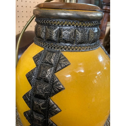 227 - YELLOW GLAZED POTTERY OVOID TABLE LAMP WITH METAL WORK MOUNTS