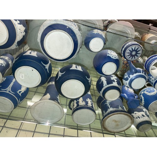 288 - SELECTION OF WEDGWOOD AND SIMILAR BLUE JASPERWARE INCLUDING BOWLS, MINIATURE JUGS AND VASES