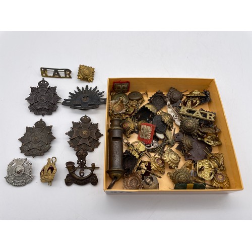 572 - BOX CONTAINING REGIMENTAL BUTTONS, LAPEL BADGES, BOY SCOUT WHISTLE, AND MORE