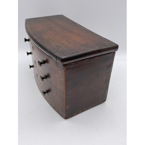 526 - EARLY 19TH CENTURY MAHOGANY TEA CADDY BOX IN FORM OF BOW FRONTED CHEST OF DRAWERS WITH CROSS BANDED ... 