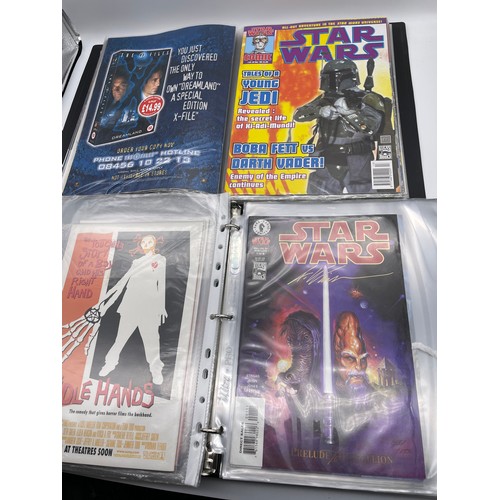 484 - TWO FOLDERS OF STARWARS ACTION COMICS SOME WITH CERTIFICATE OF AUTHENTICITY, STARWARS BOBAFET, SOME ... 