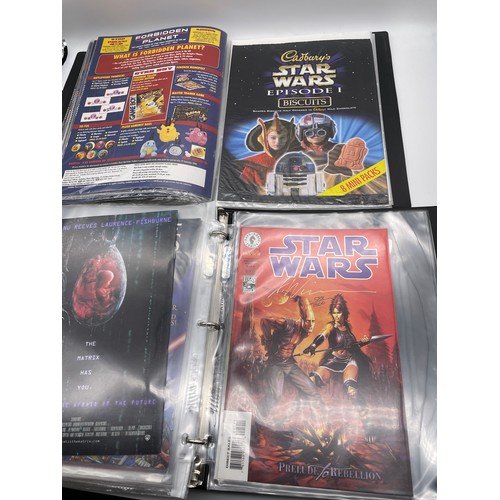 484 - TWO FOLDERS OF STARWARS ACTION COMICS SOME WITH CERTIFICATE OF AUTHENTICITY, STARWARS BOBAFET, SOME ... 