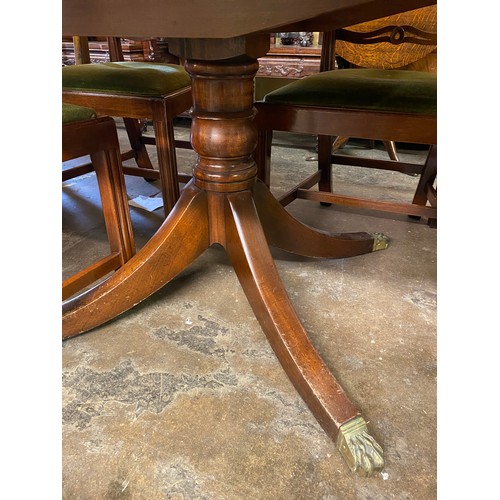 133 - GOOD QUALITY MAHOGANY EXTENDING DINING TABLE WITH SIX CHIPPENDALE DESIGN PIERCED LADDER BACK CHAIRS