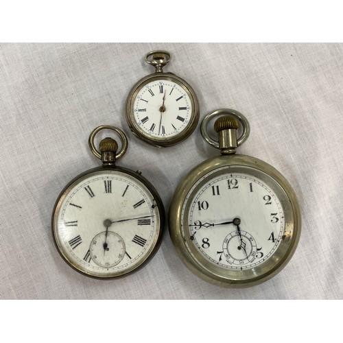 547 - 800 WHITE METAL CASED FOB WATCH AS FOUND AND A SILVER CASED POCKET WATCH AND A BASE METAL EXAMPLE AS... 