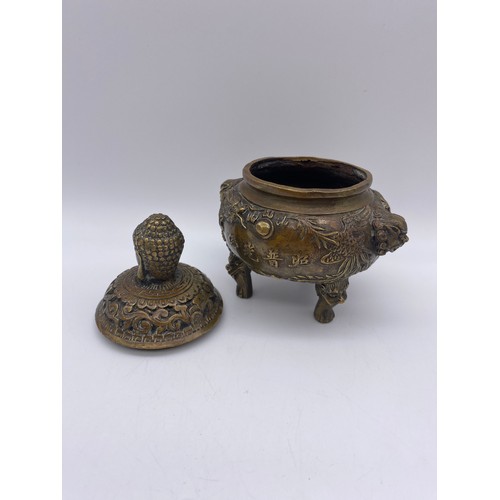 507 - BRONZE CENSOR AND COVER, COPPER CYLINDRICAL JAR AND COVER AND A BALUSTER VASE DECORATED WITH WILD AN... 