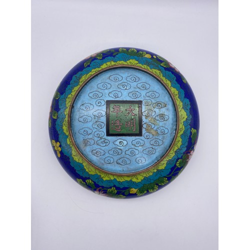 491 - CHINESE CLOISONNE ENAMEL SHALLOW BOWL DECORATED WITH FLORAL SPRAYS ON A BLUE GROUND