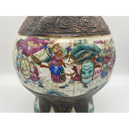 488 - CHINESE CRACKLE GLAZED BALUSTER VASE WITH MASK HANDLES PAINTED WITH FIGURES ON HORSEBACK HEIGHT 38CM... 