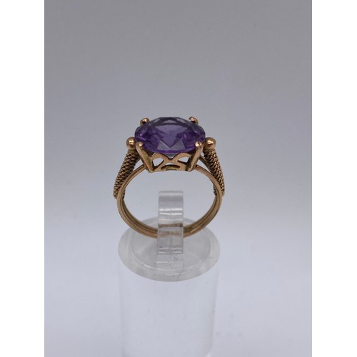 567 - ROSE GOLD AMETHYST SOLITAIRE RING CLAW SET 4.3G APPROX