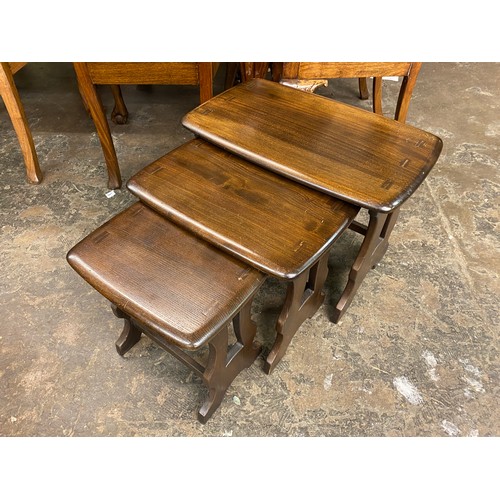 37 - NEST OF THREE ERCOL STYLE TABLES