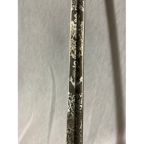 623 - NAVAL DRESS SWORD WITH A CARL EICKHORN SOLINGEN ETCHED DAMASCENED FULLERED BLADE, EAGLES HEADED GILD... 