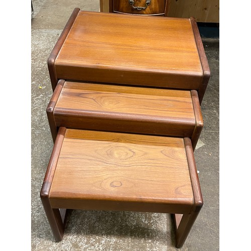 74 - NEST OF THREE TEAK TABLES