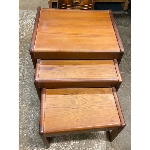 74 - NEST OF THREE TEAK TABLES