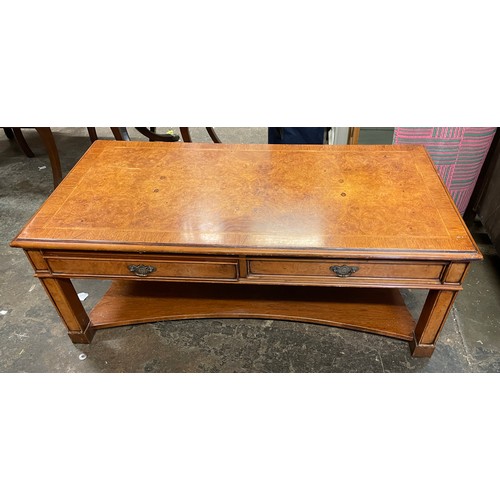 84 - WALNUT CROSS BANDED OBLONG COFFEE TABLE FITTED WITH SLIDES AND DRAWERS