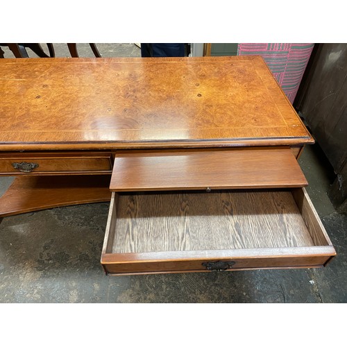 84 - WALNUT CROSS BANDED OBLONG COFFEE TABLE FITTED WITH SLIDES AND DRAWERS