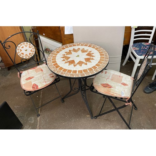 130 - MOSAIC TOP CIRCULAR PATIO TABLE AND TWO FOLDING LATTICE SEAT CHAIRS