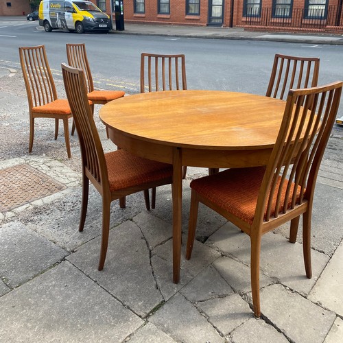 111 - 1960S TEAK CIRCULAR DINING TABLE AND SIX CHAIRS