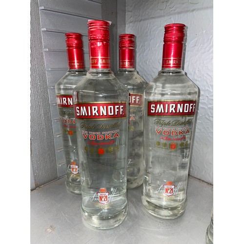 225 - FOUR BOTTLES OF SMIRNOFF TRIPLE VODKA