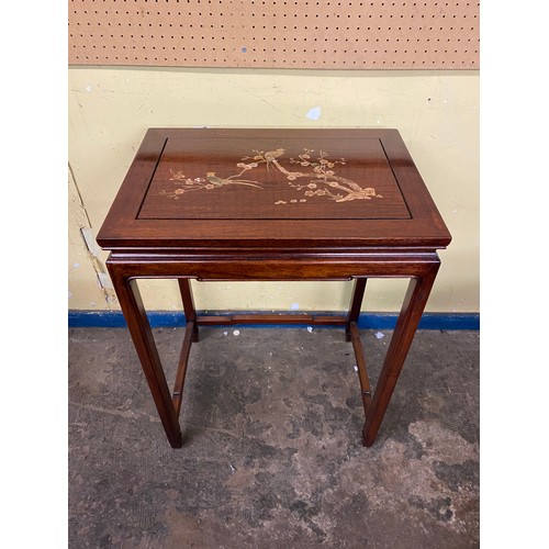 134 - CHINESE INSPIRED ROSEWOOD NEST OF FOUR TABLES INLAID WITH FLOWERS AND INSECT DECORATION