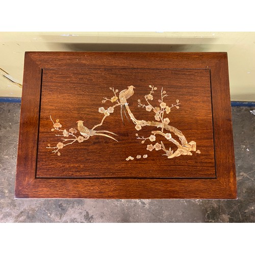 134 - CHINESE INSPIRED ROSEWOOD NEST OF FOUR TABLES INLAID WITH FLOWERS AND INSECT DECORATION