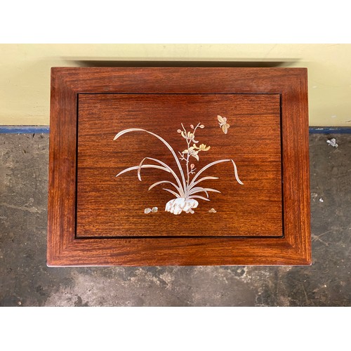 134 - CHINESE INSPIRED ROSEWOOD NEST OF FOUR TABLES INLAID WITH FLOWERS AND INSECT DECORATION