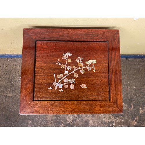 134 - CHINESE INSPIRED ROSEWOOD NEST OF FOUR TABLES INLAID WITH FLOWERS AND INSECT DECORATION