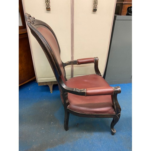 18 - VICTORIAN REXINE LEATHER UPHOLSTERED GENTLEMANS ARMCHAIR