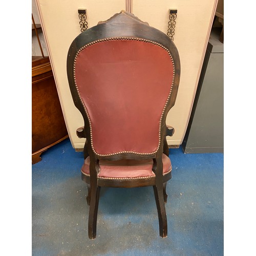 18 - VICTORIAN REXINE LEATHER UPHOLSTERED GENTLEMANS ARMCHAIR