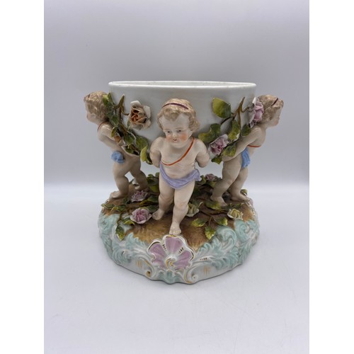 572 - SITZENDORF PUTTO AND FLORAL ENCRUSTED OIL LAMP