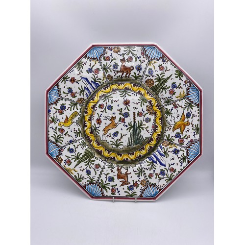 646 - HAND PAINTED OCTAGONAL FAIENCE WALL PLATE DECORATED WITH DEER AND BIRDS