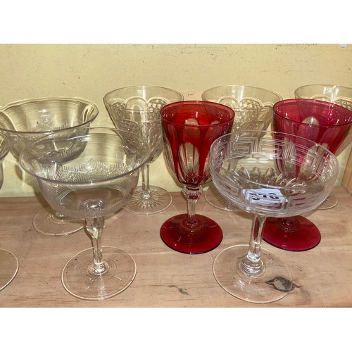 570 - SIX EARLY 20TH CENTURY CHAMPAGNE GLASSES, TWO RUBY FLASHED GOBLETS AND OTHER GLASS