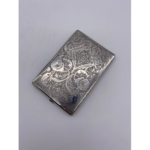 623 - UNMARKED WHITE METAL ENGRAVED CIGARETTE CASE DECORATED WITH DRAGONS AND BIRDS 5.1 OZ APPROX OVERALL