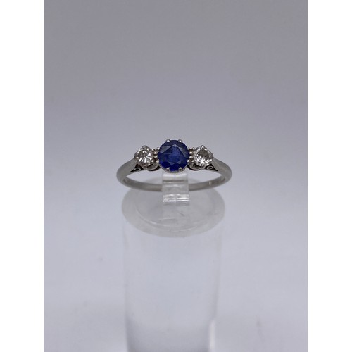 628 - PLATINUM DIAMOND AND SAPPHIRE THREE STONE RING 2.1G APPROX SIZE N