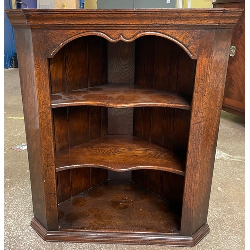 74 - OAK OPEN HANGING CORNER CABINET WITH SERPENTINE SHELVES